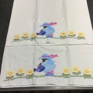 2 Vintage garden girl pillow cases with hand embroidered cottage granny core